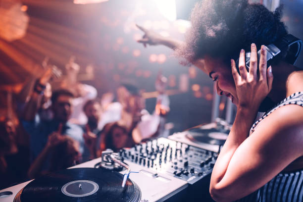 young woman playing music at the club